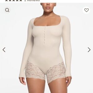 Skims Fits Everybody Lace Long Sleeved Onesie
